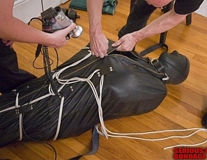 S305_MALEBONDAGE_Double Squeeze_MisterX_StraitjacketInsideSleepsack